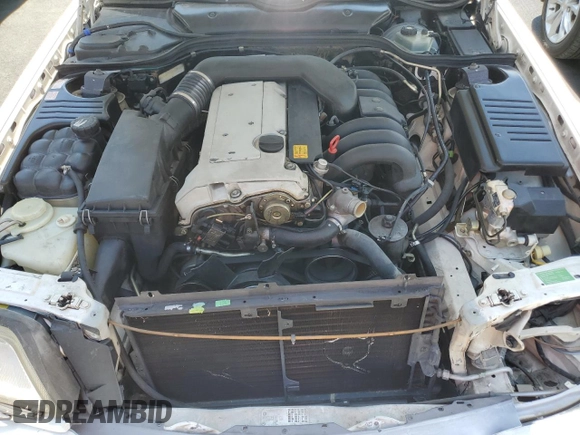 1994 Mercedes-Benz SL z VIN WDBFA63EXRF097007, wystawiony jako Copart lot #59714045 z przebiegiem Nie podano mil oraz Szkoda całkowita • Salvage title. Historia ofert i sprzedaży dostępna na DreamBid. Obrazek 11.