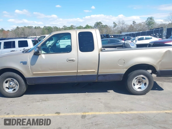 2000 Ford F-150 XL with VIN 1FTRX17L8YNB02069, listed as a IAAI auction lot 41813272 with 279,042 mi miles and . Bid and sale history available at DreamBid. Image 14.
