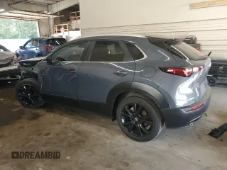 2023 Mazda CX-30 S Preferred with VIN 3MVDMBCM0PM575057, listed as a Copart auction lot 63506665 with 47,556 mi miles and Salvage title. Bid and sale history available at DreamBid. Image 2.