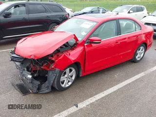 2014 Volkswagen Jetta TDI w/Premium/Nav with VIN 3VWLL7AJ4EM383351, listed as a IAAI auction lot 42424074 with 66,824 mi miles and . Bid and sale history available at DreamBid. Image 19.