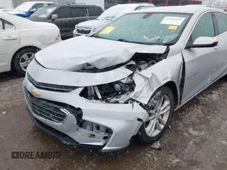 2018 Chevrolet Malibu LT z VIN 1G1ZD5STXJF269890, wystawiony jako IAAI lot #41504935 z przebiegiem 107 190 mil mil oraz . Historia ofert i sprzedaży dostępna na DreamBid. Obrazek 6.