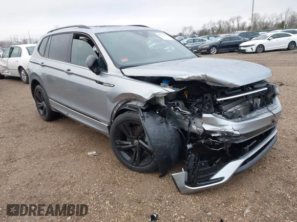 2023 Volkswagen Tiguan SE R-Line Black with VIN 3VV8B7AX3PM130610, listed as a IAAI auction lot 42011131 with 21,980 mi miles and . Bid and sale history available at DreamBid. Image 1.