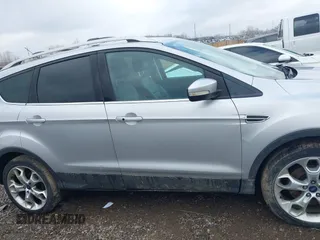 2013 Ford Escape Titanium with VIN 1FMCU9J90DUC22888, listed as a IAAI auction lot 41664550 with 185,568 mi miles and . Bid and sale history available at DreamBid. Image 13.