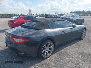 2013 Maserati GranTurismo Convertible Sport with VIN ZAM45MMA2D0069786, listed as a IAAI auction lot 40874830 with 37,312 mi miles. Bid and sale history available at carsss.com. Image 4.
