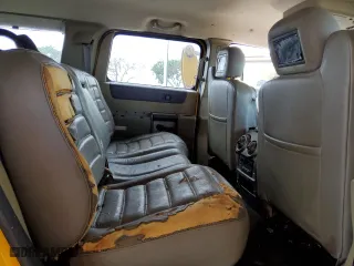 2003 Hummer H2 with VIN 5GRGN23U63H106323, listed as a Copart auction lot 76447054 with 0 mi miles and Clean Title. Bid and sale history available at carsss.com. Image 10.