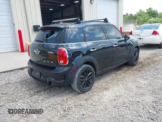 2016 MINI Countryman S z VIN WMWZC3C58GWP53495, wystawiony jako IAAI lot #42134455 z przebiegiem 92 862 mil mil oraz . Historia ofert i sprzedaży dostępna na DreamBid. Obrazek 4.