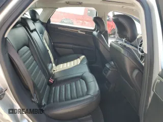 2013 Ford Fusion SE Hybrid z VIN 3FA6P0LU3DR336838, wystawiony jako Copart lot #56205445 z przebiegiem 209 164 mil mil oraz Czysty tytuł • Clean title. Historia ofert i sprzedaży dostępna na DreamBid. Obrazek 10.
