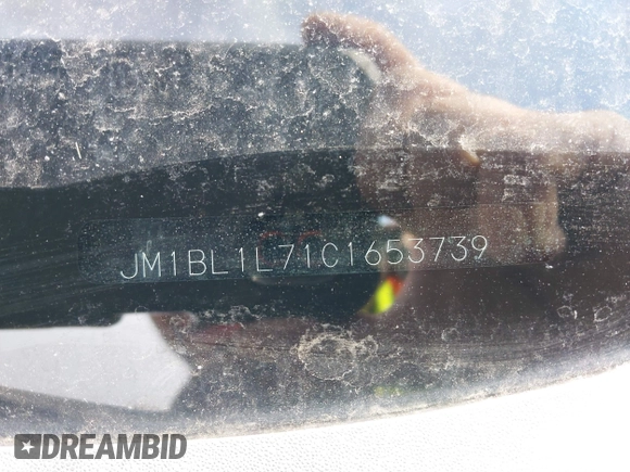 2012 Mazda 3 i Touring with VIN JM1BL1L71C1653739, listed as a IAAI auction lot 42023330 with 140,027 mi miles and . Bid and sale history available at DreamBid. Image 9.