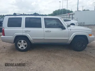 2010 Jeep Commander Sport with VIN 1J4RH4GKXAC157379, listed as a IAAI auction lot 42130174 with 193,337 mi miles and . Bid and sale history available at DreamBid. Image 13.