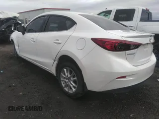 2015 Mazda 3 i Grand Touring z VIN JM1BM1W75F1232796, wystawiony jako IAAI lot #39976305 z przebiegiem 69 161 mil mil oraz . Historia ofert i sprzedaży dostępna na DreamBid. Obrazek 3.