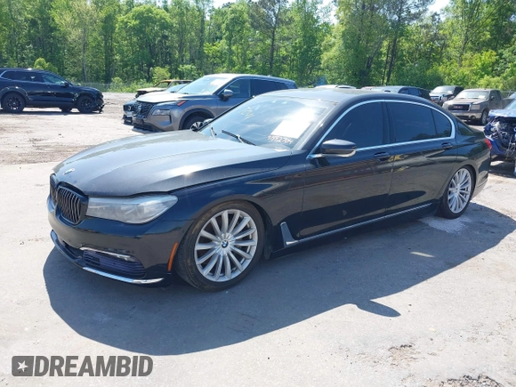 2016 BMW 7 Series 740i with VIN WBA7E2C55GG547752, listed as a IAAI auction lot 41992704 with Not Provided miles and . Bid and sale history available at carsss.com. Image 16.
