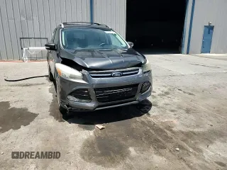 2015 Ford Escape Titanium z VIN 1FMCU0J98FUB06577, wystawiony jako Copart lot #61341175 z przebiegiem 66 206 mil mil oraz Szkoda całkowita • Salvage title. Historia ofert i sprzedaży dostępna na DreamBid. Obrazek 14.