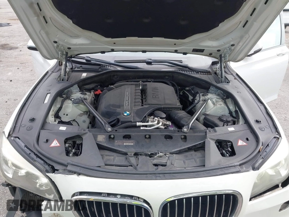 2013 BMW 7 Series 740i with VIN WBAYA6C52DD143862, listed as a IAAI auction lot 41859183 with 133,666 mi miles. Bid and sale history available at carsss.com. Image 10.
