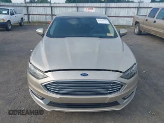 2018 Ford Fusion SE z VIN 3FA6P0HD6JR279927, wystawiony jako IAAI lot #42430172 z przebiegiem 145 080 mil mil oraz . Historia ofert i sprzedaży dostępna na DreamBid. Obrazek 12.
