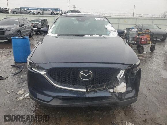 2021 Mazda CX-5 Grand Touring with VIN JM3KFBDM0M0391325, listed as a Copart auction lot 44863215 with 21,997 mi miles and Salvage Title. Bid and sale history available at DreamBid. Image 5.