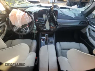 2021 BMW M5 with VIN WBS83CH0XMCH58055, listed as a Copart auction lot 79473464 with 0 mi miles and Salvage Title. Bid and sale history available at carsss.com. Image 8.