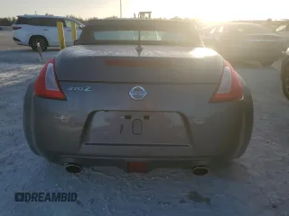 2014 Nissan 370Z Touring with VIN JN1AZ4FH4EM620092, listed as a Copart auction lot 77439254 with 38,662 mi miles and Salvage Title. Bid and sale history available at DreamBid. Image 6.