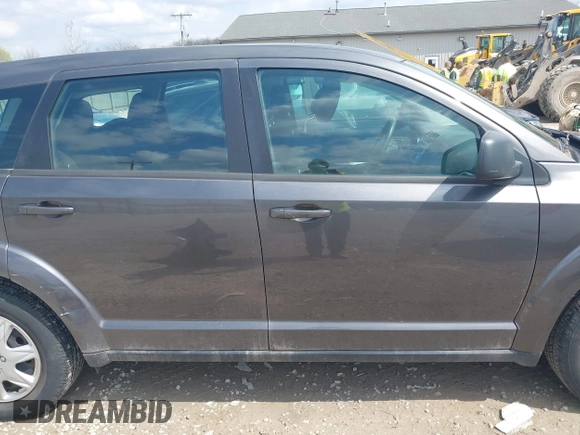 2014 Dodge Journey SE with VIN 3C4PDCAB1ET219760, listed as a IAAI auction lot 42013441 with 106,212 mi miles and . Bid and sale history available at carsss.com. Image 14.