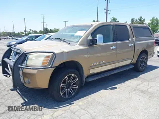 2005 Nissan Titan LE with VIN 1N6AA07B95N508001, listed as a IAAI auction lot 42656008 with 196,542 mi miles and . Bid and sale history available at DreamBid. Image 2.