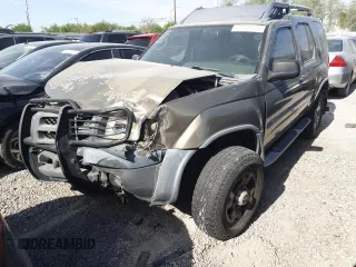 2001 Nissan Xterra XE z VIN 5N1ED28T91C541628, wystawiony jako Copart lot #57712125 z przebiegiem 104 738 mil mil oraz Szkoda całkowita • Salvage title. Historia ofert i sprzedaży dostępna na DreamBid. Obrazek 1.