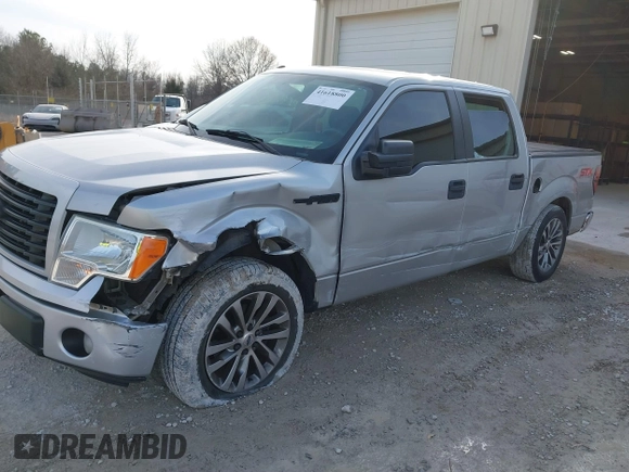 2014 Ford F-150 XL with VIN 1FTFW1CF9EKD01358, listed as a IAAI auction lot 41618800 with 220,888 mi miles. Bid and sale history available at carsss.com. Image 6.
