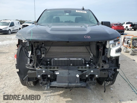 2023 Chevrolet Silverado 1500 RST with VIN 3GCUDEE80PG114796, listed as a Copart auction lot 87941025 with 7,454 mi miles and Salvage Title. Bid and sale history available at carsss.com. Image 5.
