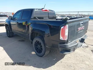 2021 GMC Canyon 2WD Elevation with VIN 1GTG5CEN8M1210433, listed as a IAAI auction lot 41787940 with 77,581 mi miles. Bid and sale history available at carsss.com. Image 3.