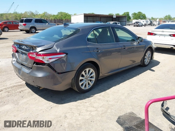 2019 Toyota Camry LE with VIN 4T1B11HK8KU289721, listed as a IAAI auction lot 42021107 with 69,828 mi miles and . Bid and sale history available at DreamBid. Image 4.