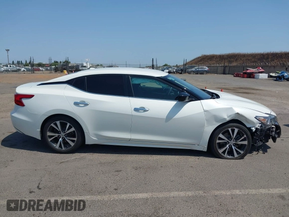 2017 Nissan Maxima SL with VIN 1N4AA6AP1HC409561, listed as a IAAI auction lot 42452859 with 107,640 mi miles and . Bid and sale history available at DreamBid. Image 14.