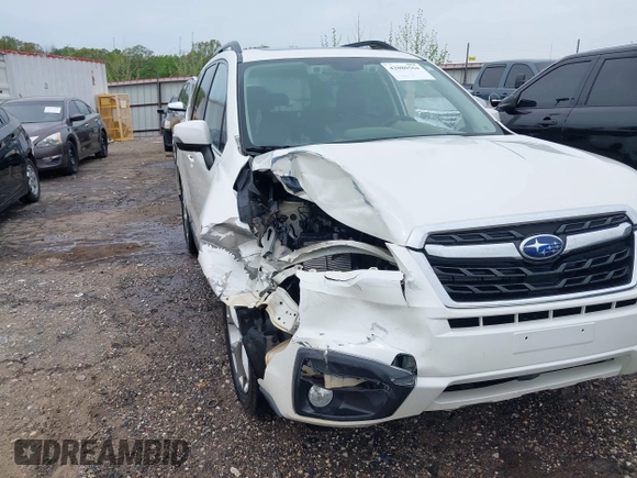 2017 Subaru Forester Touring with VIN JF2SJAWCXHH501702, listed as a IAAI auction lot 42080564 with 188,392 mi miles and . Bid and sale history available at DreamBid. Image 6.