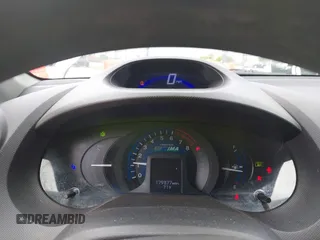 2012 Honda Insight LX with VIN JHMZE2H51CS002447, listed as a IAAI auction lot 42353583 with 179,377 mi miles and . Bid and sale history available at DreamBid. Image 7.