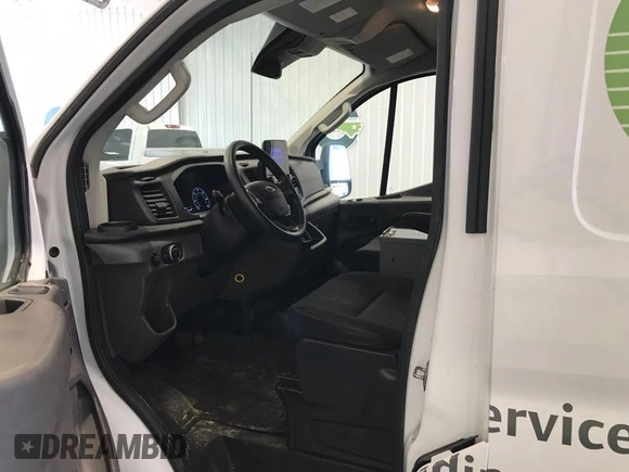2020 Ford Transit Cargo with VIN 1FTBR2YG9LKA32434, listed as a IAAI auction lot 42718925 with 66,381 mi miles and . Bid and sale history available at DreamBid. Image 6.