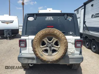 2018 Jeep Wrangler Unlimited Sport S with VIN 1C4HJXDG8JW127299, listed as a IAAI auction lot 42091561 with 116,082 mi miles and . Bid and sale history available at DreamBid. Image 16.