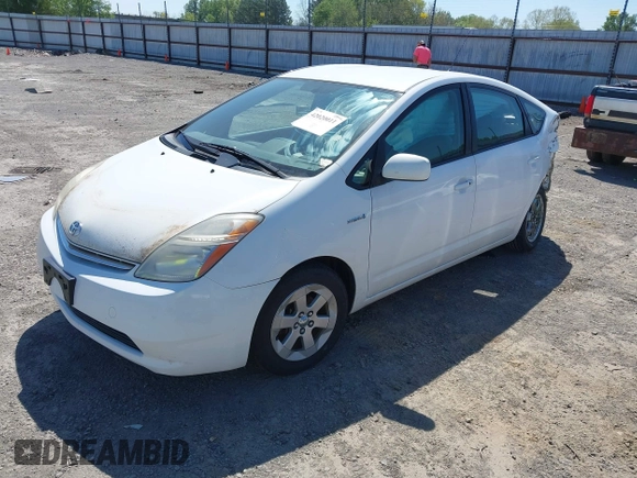2009 Toyota Prius with VIN JTDKB20U493541873, listed as a IAAI auction lot 42020011 with 165,842 mi miles. Bid and sale history available at carsss.com. Image 2.