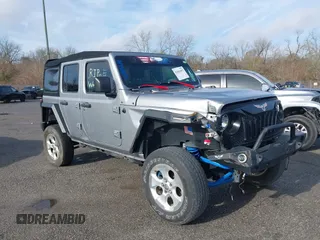 2020 Jeep Wrangler Unlimited Sport S z VIN 1C4HJXDG4LW221778, wystawiony jako IAAI lot #41441662 z przebiegiem 76 026 mil mil oraz . Historia ofert i sprzedaży dostępna na DreamBid. Obrazek 1.