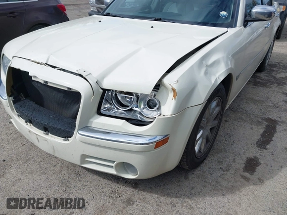 2007 Chrysler 300 C with VIN 2C3KA63HX7H898174, listed as a IAAI auction lot 42000604 with 73,493 mi miles. Bid and sale history available at carsss.com. Image 6.