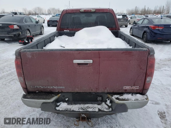 2010 GMC Canyon z VIN 1GTKTFDE5A8123398, wystawiony jako Copart lot #88504215 z przebiegiem 199 472 mil mil oraz Szkoda całkowita • Salvage title. Historia ofert i sprzedaży dostępna na DreamBid. Obrazek 6.