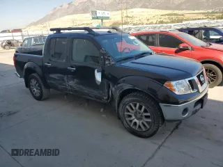 2012 Nissan Frontier SV with VIN 1N6AD0EV2CC459544, listed as a Copart auction lot 75470014 with 101,565 mi miles and Salvage title. Bid and sale history available at DreamBid. Image 4.