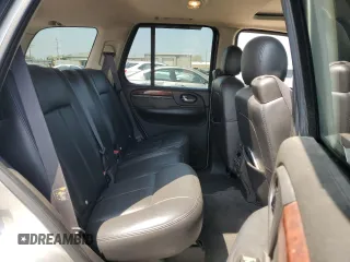 2006 GMC Envoy SLE z VIN 1GKDT13S662171123, wystawiony jako Copart lot #56418255 z przebiegiem 106 777 mil mil oraz Szkoda całkowita • Salvage title. Historia ofert i sprzedaży dostępna na DreamBid. Obrazek 11.