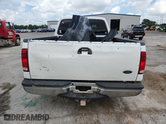 2002 Ford F-250 XL with VIN 1FTNW20F32EA27266, listed as a Copart auction lot 63110855 with 265,546 mi miles and Salvage title. Bid and sale history available at DreamBid. Image 6.