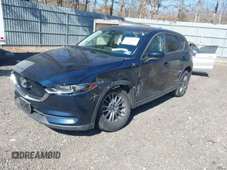 2017 Mazda CX-5 Touring with VIN JM3KFBCL5H0193919, listed as a IAAI auction lot 41751832 with 62,694 mi miles. Bid and sale history available at carsss.com. Image 17.