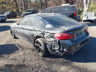 2019 BMW 4 Series 440i xDrive with VIN WBA4J7C52KBM75345, listed as a IAAI auction lot 40613703 with 31,402 mi miles and . Bid and sale history available at carsss.com. Image 3.