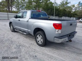 2010 Toyota Tundra 2WD Truck with VIN 5TFRU5F13AX024097, listed as a IAAI auction lot 41473230 with 196,411 mi miles. Bid and sale history available at carsss.com. Image 3.