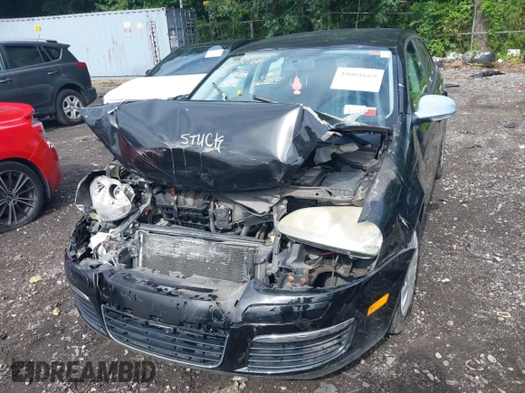 2008 Volkswagen Jetta Sedan S with VIN 3VWJZ71K28M102750, listed as a IAAI auction lot 39861440 with 56,089 mi miles. Bid and sale history available at carsss.com. Image 6.