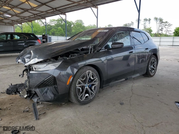 2022 BMW iX xDrive50 with VIN WB523CF02NCJ71343, listed as a Copart auction lot 53404674 with 14,917 mi miles and Salvage Title. Bid and sale history available at carsss.com. Image 1.