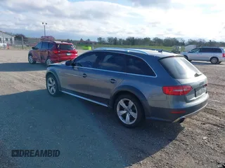 2014 Audi allroad A4 Premium Plus z VIN WA1UFAFL8EA133365, wystawiony jako IAAI lot #42034903 z przebiegiem 145 285 mil mil oraz . Historia ofert i sprzedaży dostępna na DreamBid. Obrazek 3.