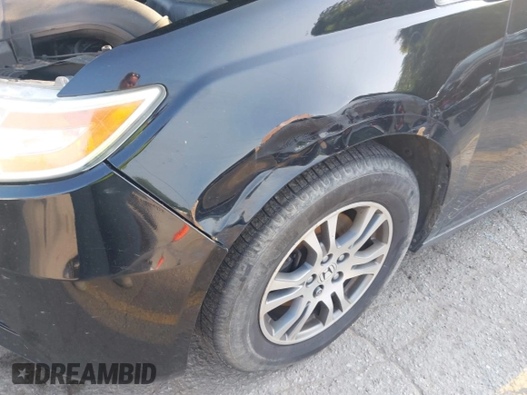 2012 Honda Odyssey EX-L with VIN 5FNRL5H60CB075811, listed as a IAAI auction lot 42518159 with 243,186 mi miles and . Bid and sale history available at DreamBid. Image 6.