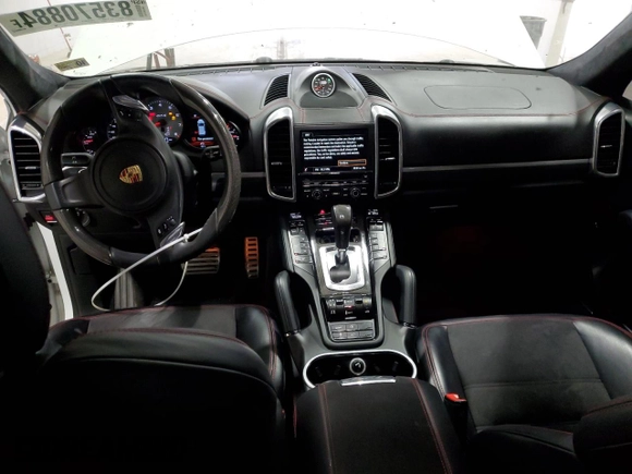 2013 Porsche Cayenne GTS with VIN WP1AD2A24DLA76344, listed as a Copart auction lot 83570884 with 63,704 mi miles and Salvage title. Bid and sale history available at DreamBid. Image 8.