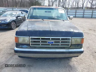 1991 Ford F-150 with VIN 1FTDF15Y2MNA84402, listed as a IAAI auction lot 41788034 with 1 mi miles. Bid and sale history available at carsss.com. Image 6.