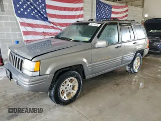 1998 Jeep Grand Cherokee Limited with VIN 1J4GZ78Y8WC285670, listed as a Copart auction lot 70213044 with 128,382 mi miles and Clean Title. Bid and sale history available at carsss.com. Image 1.